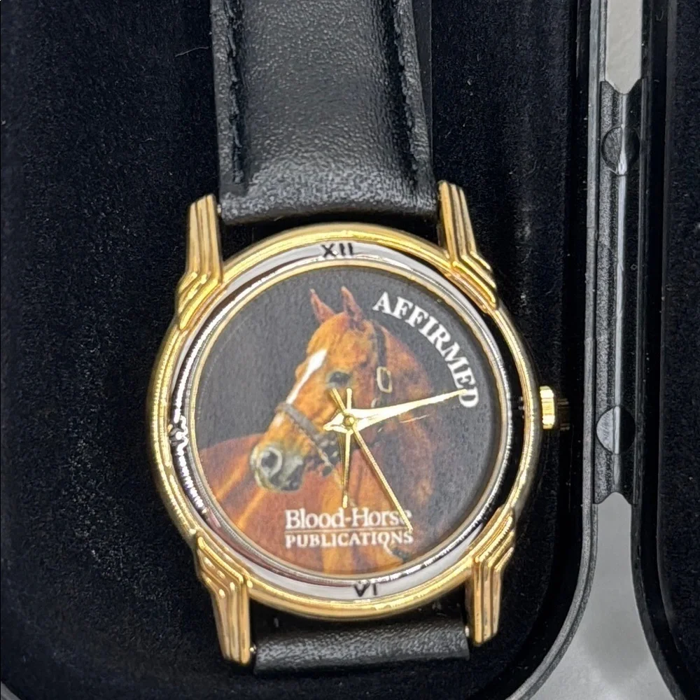 Vintage Affirmed Black and Gold Watch with Horse Design lot W2
